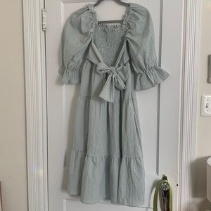 Sage green gingham tie back dress